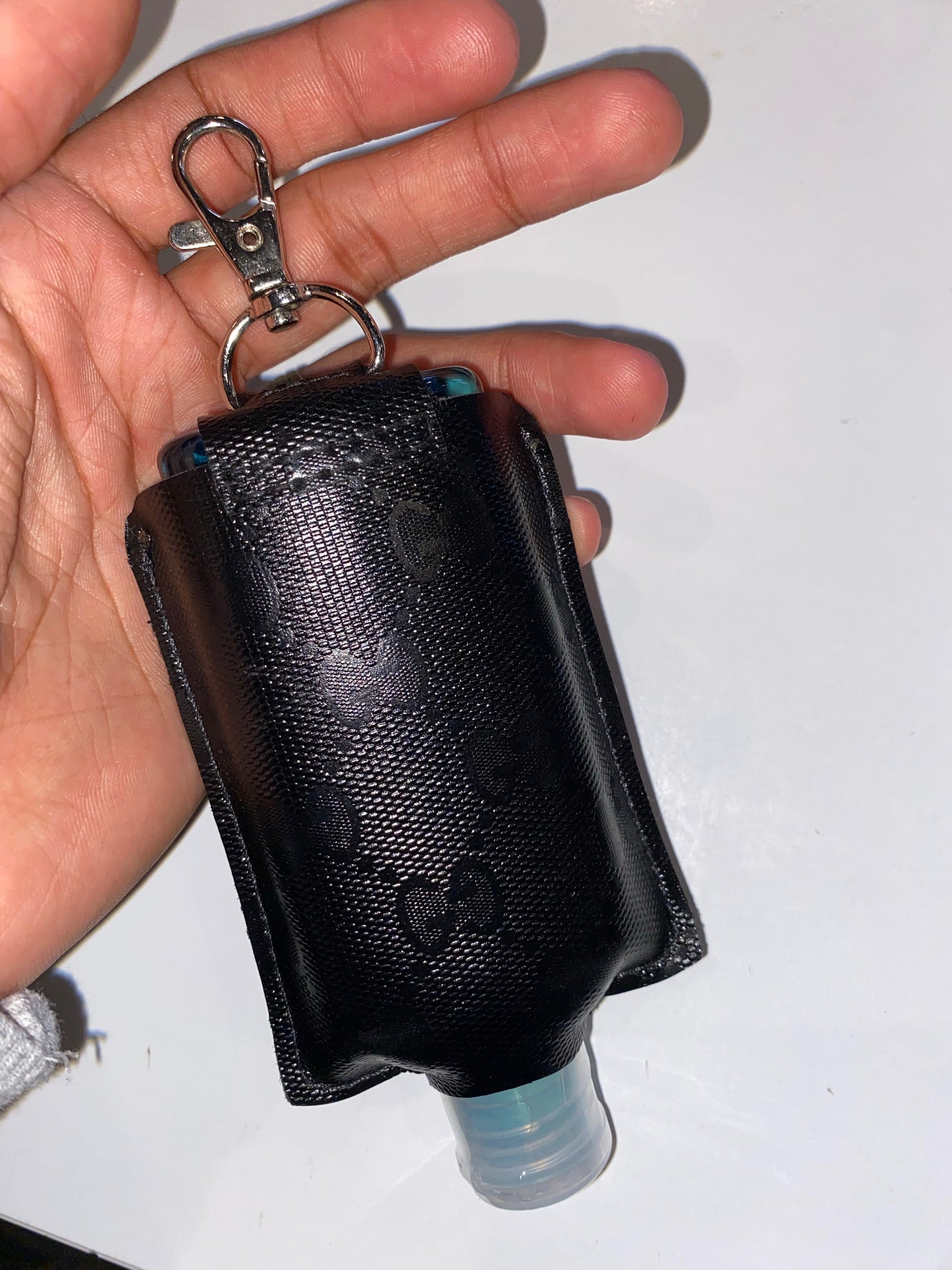 Custom made GG Imprime hand sanitiser bottle